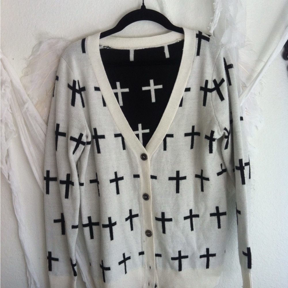 Cross sweater